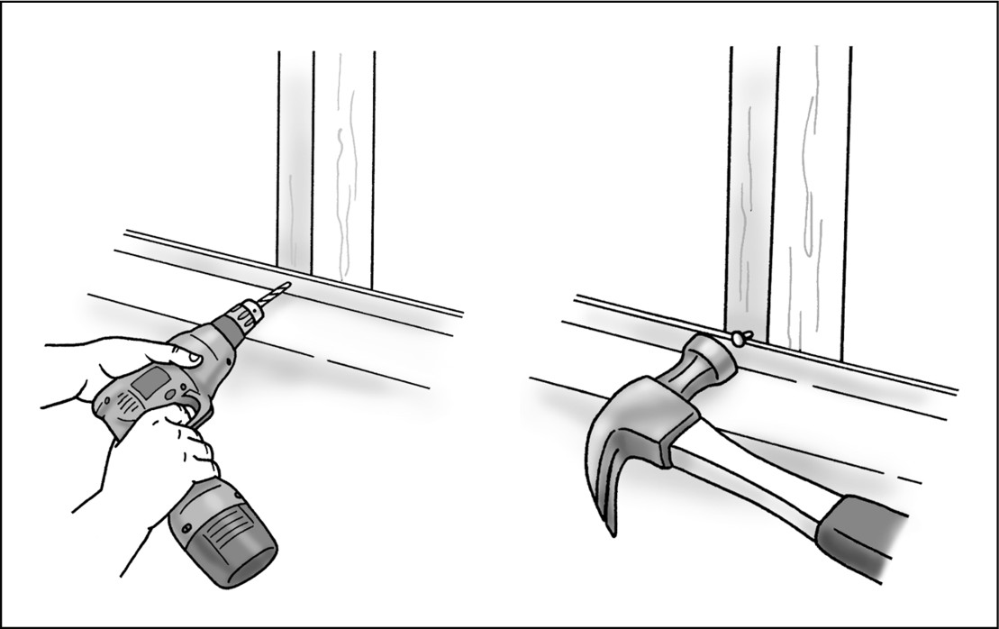 Figure 6-5: Securing the tub flange to the wall studs with roofing nails.